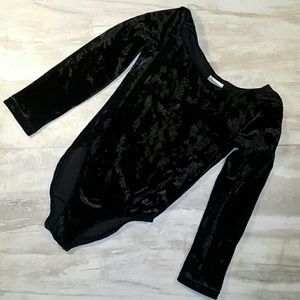 Girls Danskin Now leotard. Size 6 / 6x. Black.